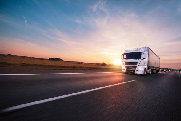istock Truck with container on road, cargo transportation concept. 1040454368