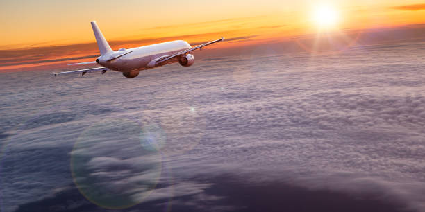 istock Commercial airplane flying above dramatic clouds. 1040454414