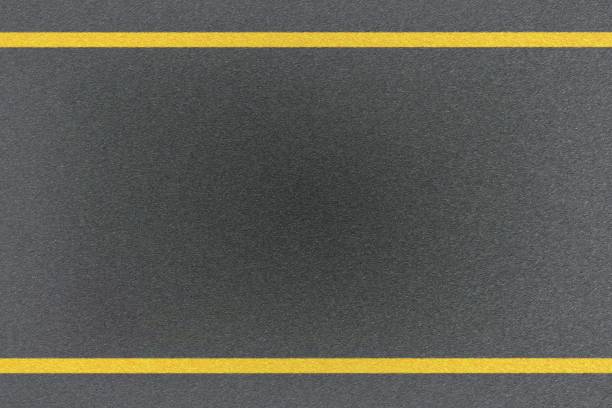 top view of traffic yellow line marking on metal platform, abstract background - road top view imagens e fotografias de stock