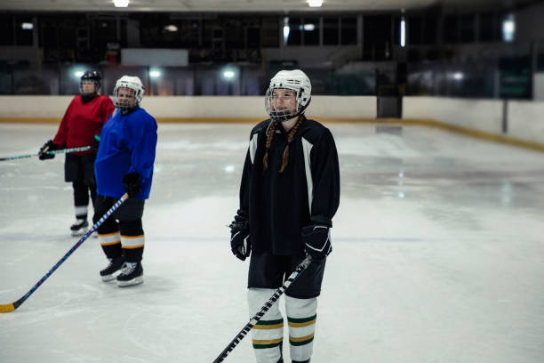 istock Female Ice Hockey Players During Training 1040455842