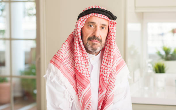 istock Middle age arabian man at home with a confident expression on smart face thinking serious 1040456004
