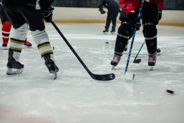 istock Ice Hockey Players Skating on the Ice 1040456046