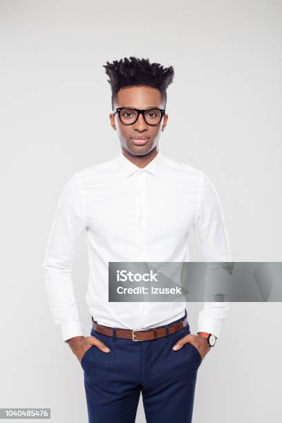 Handsome Businessman With His Hands In Pocket Stock Photo - Download Image Now - Button Down Shirt, Males, Portrait