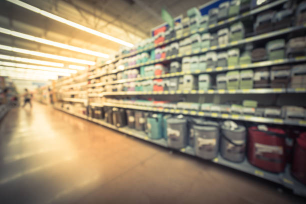 istock Blurry background customer shopping for bedding, comforters at retail store in USA 1040486000