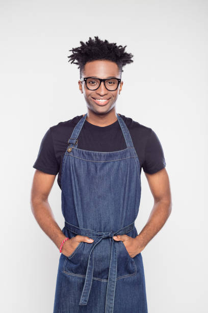 portrait of afro american shop worker - isolated on white young adult beautiful people curly hair imagens e fotografias de stock