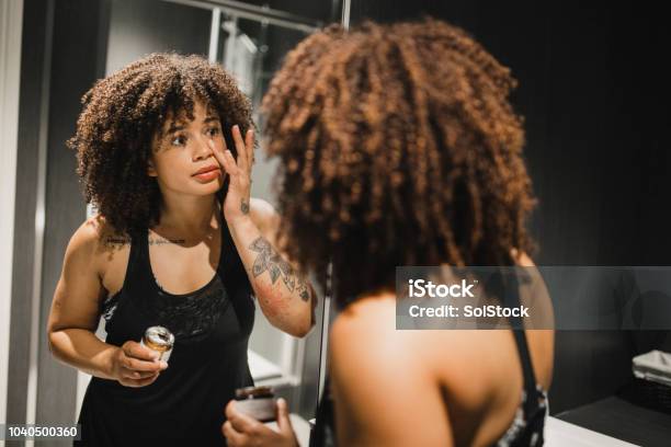 Taking Care Of Her Skin Stock Photo - Download Image Now - Skin Care, Sport, Moisturizer