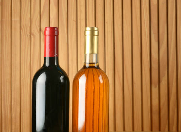 bottles of red and white wine - closeup