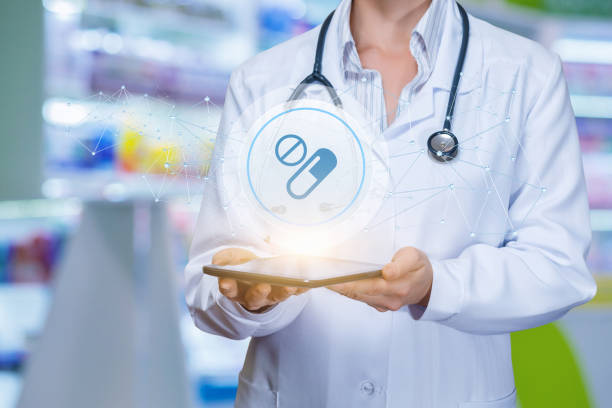 istock Doctor shows pills in the network . 1040511116