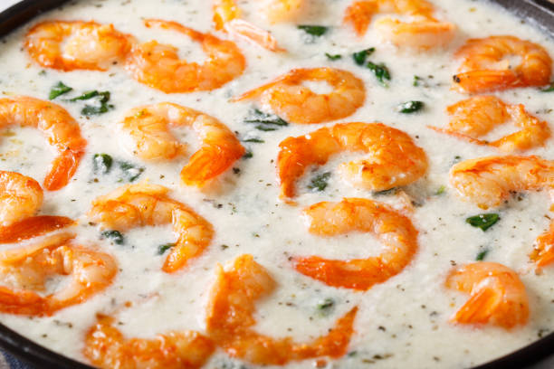 istock creamy garlic butter tuscan shrimp with spinach macro. horizontal 1040514794