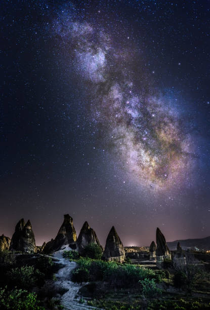 Fairy Chimneys With Milky Way At Cappadocia, Goreme, Turkey stock photo