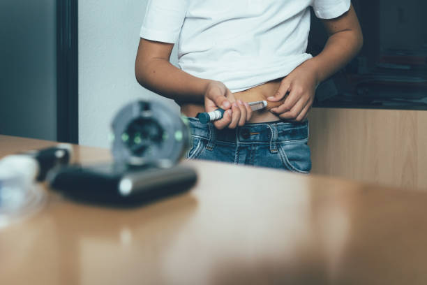 istock Young diabetic patient injects insulin 1040523764