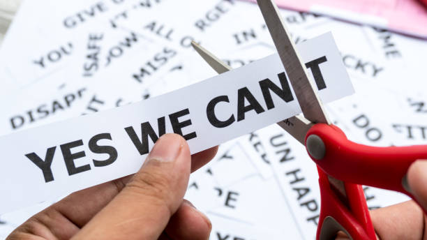istock yes we can text or word meaning on paper in hand holding 1040535252