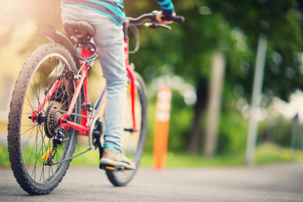 istock child on a bicycle on pedestrian way 1040536222