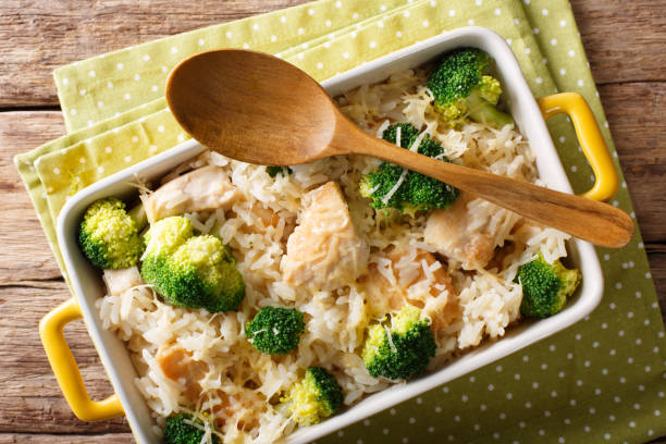 istock Delicious rice with broccoli, chicken and cheese close-up in a baking dish. horizontal top view 1040536476