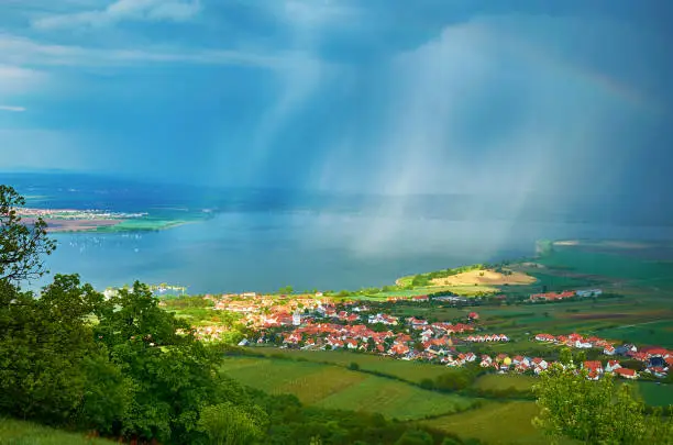 View of Lake Nove Mlyny in the Palava region in southern Moravia in the Czech Republic. Rain and rainbow