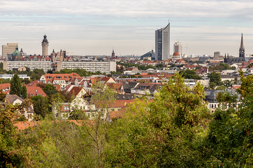 Panorama of the city of Leipzig with tall buildings, town hall and churches