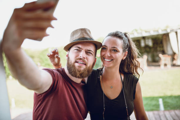 istock Handsome Couple Taking a Selfie 1040563008