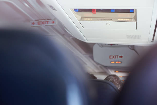 istock Airplane fasten seat belt sign 1040570632