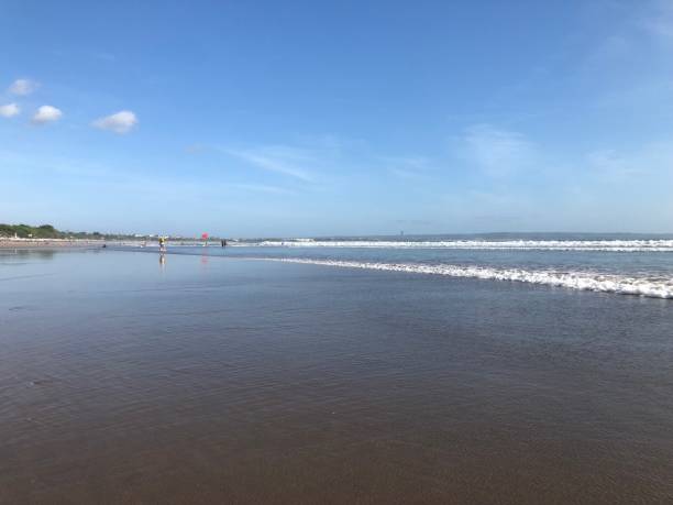 istock jimbaran beach, paradise sandy beach in bali, Indonesia 1040575582