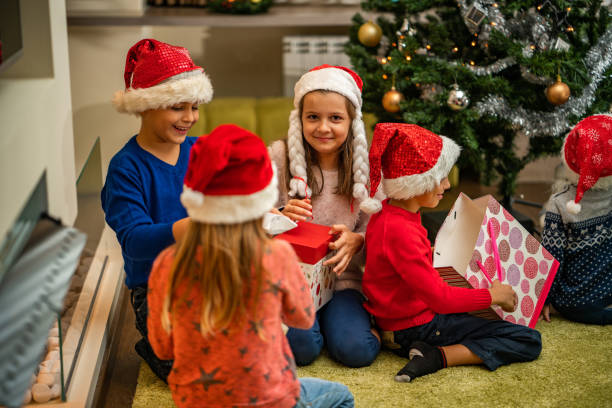 istock Children opening presents for new year 1040575736