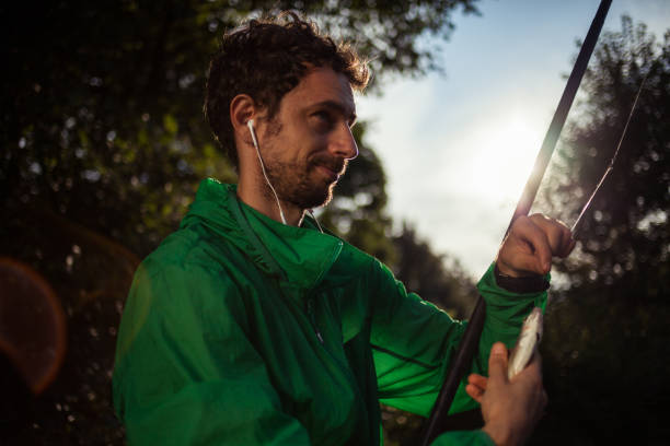 istock Fisherman fishing and enjoying in a weekend 1040576108