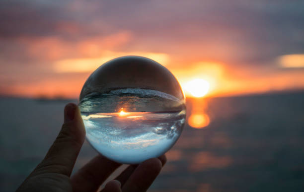 istock Sunset on Ocean Horizon Captured in Glass Ball 1040578440