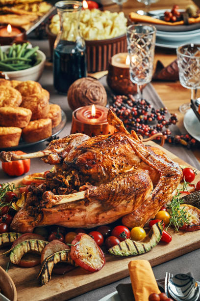 istock Family Having Traditional Holiday Stuffed Turkey Dinner 1040584796