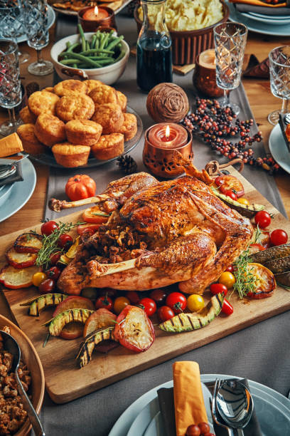 istock Family Having Traditional Holiday Stuffed Turkey Dinner 1040584798
