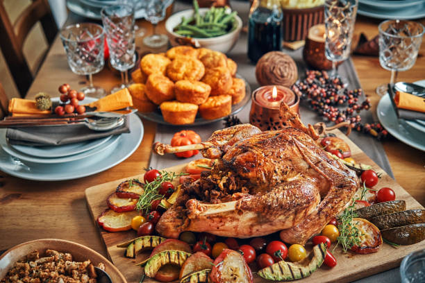 istock Family Having Traditional Holiday Stuffed Turkey Dinner 1040584902