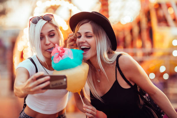istock Friends in amusement park 1040585570