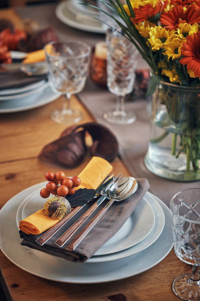 istock Decorated Table for Thanksgiving Dinner with Candles, Pumpkins, Leafs and Nuts 1040586056