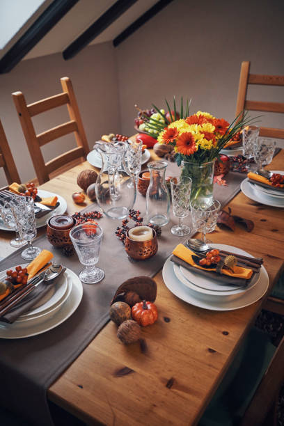 istock Decorated Table for Thanksgiving Dinner with Candles, Pumpkins, Leafs and Nuts 1040586066