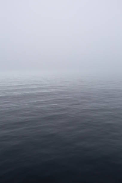 istock Calm, zen like grey misty ocean. Rippled texture 1040592194
