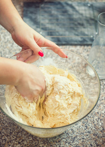 istock Woman Preparing Donuts at Home 1040604030