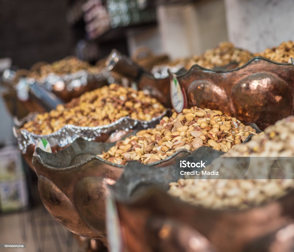 Pistachios Detail of the traditional local pistachios and almonds market. Iran, Ahvaz. Bazaar Market Stock Photo