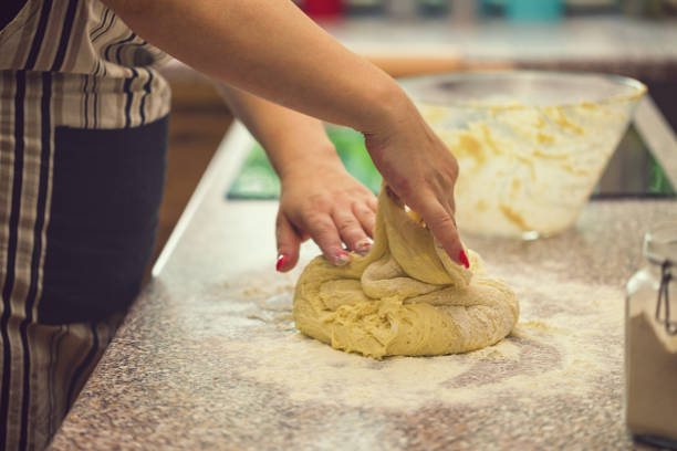istock Woman Preparing Donuts at Home 1040604452