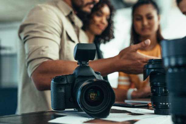 istock Close up of a digital camera on a table 1040608624