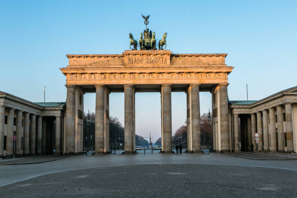 istock The Brandenburg Gate in Berlin at sunrise, Germany 1040608952