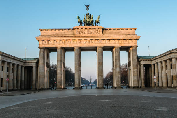 istock The Brandenburg Gate in Berlin at sunrise, Germany 1040608960