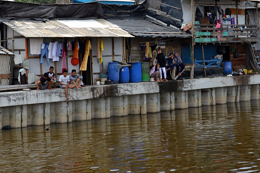 Happy people at the Wharf Pelabuhan Sunda on a sunny day in Jakarta, Indonesia