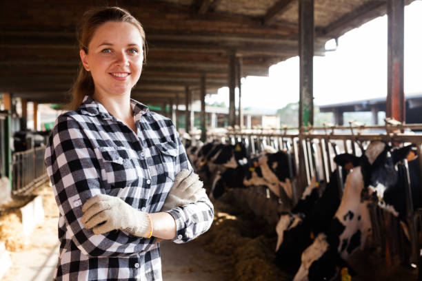 istock Female farmer on dairy farm 1040614212