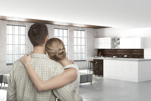 istock Young caucasian couple in modern kitchen 1040629814