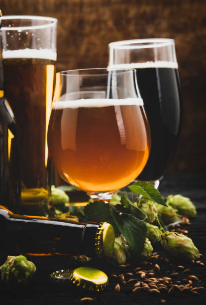 istock Green hops with a glass of fresh beer 1040643484