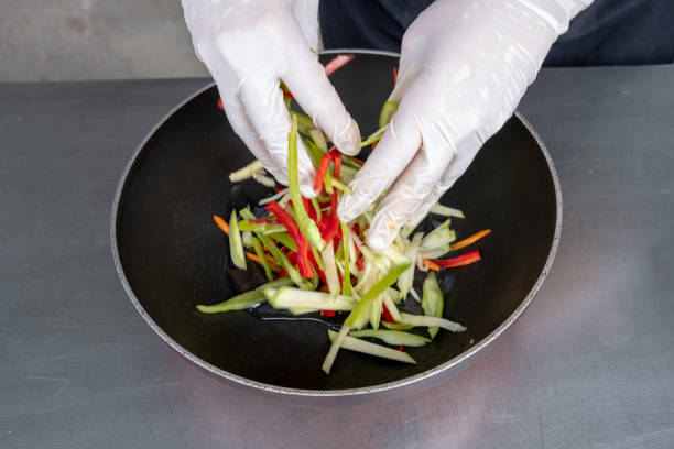 istock Chef in hotel or restaurant kitchen cooking only hands 1040645152