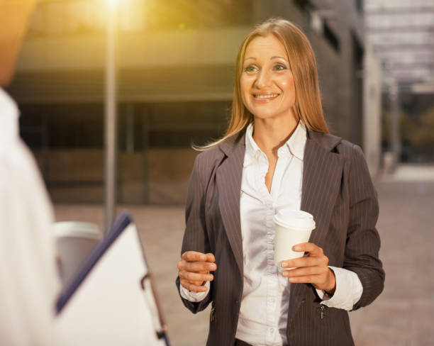 istock Female is talking with partner before signing contract 1040651706