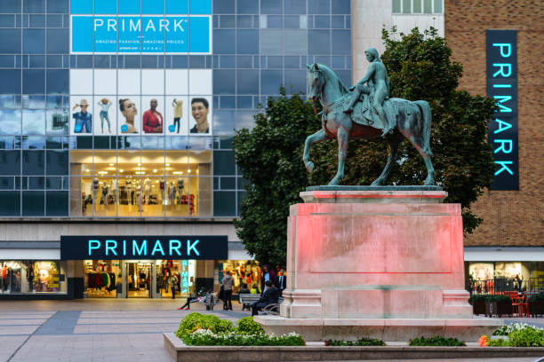 Coventry Town Centre Lady Godiva Statue with Primark Building Coventry, UK - September 14th, 2018 : Coventry Town Centre Primark Building and Lady Godiva, a statue by Sir William Reid Dick unveiled at midday on 22 October 1949 in Broadgate, Coventry coventry godiva stock pictures, royalty-free photos & images