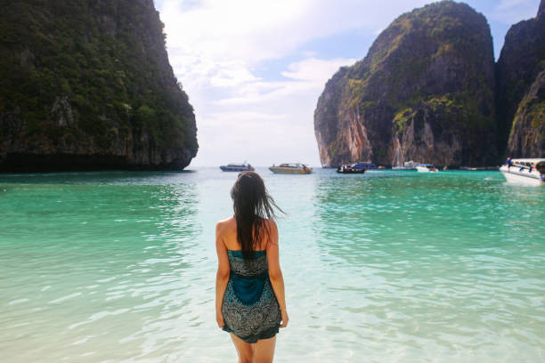 istock Young woman at the Maya Bay beach on Koh Phi Phi islands in Thailand 1040697400