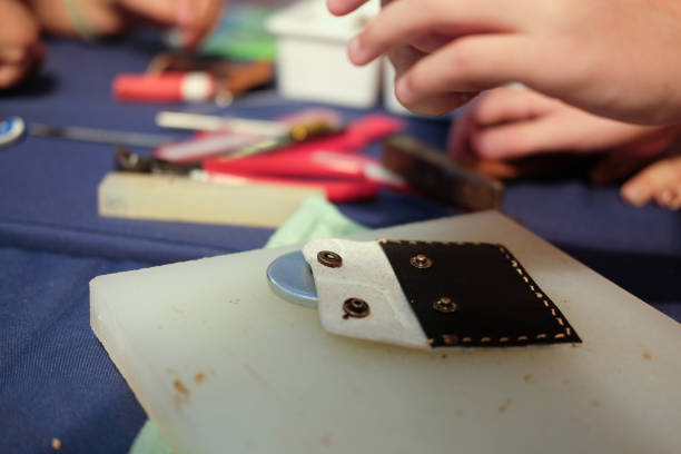 istock craftsman making leather bag. handmade DIY handicraft 1040705030