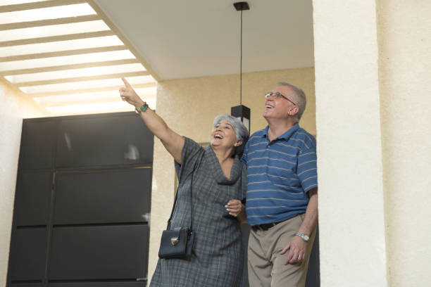 istock Senior Couple Leaving Home For a Walk 1040746088
