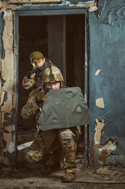 istock the people in uniform with weapons in the ruins 1040795188